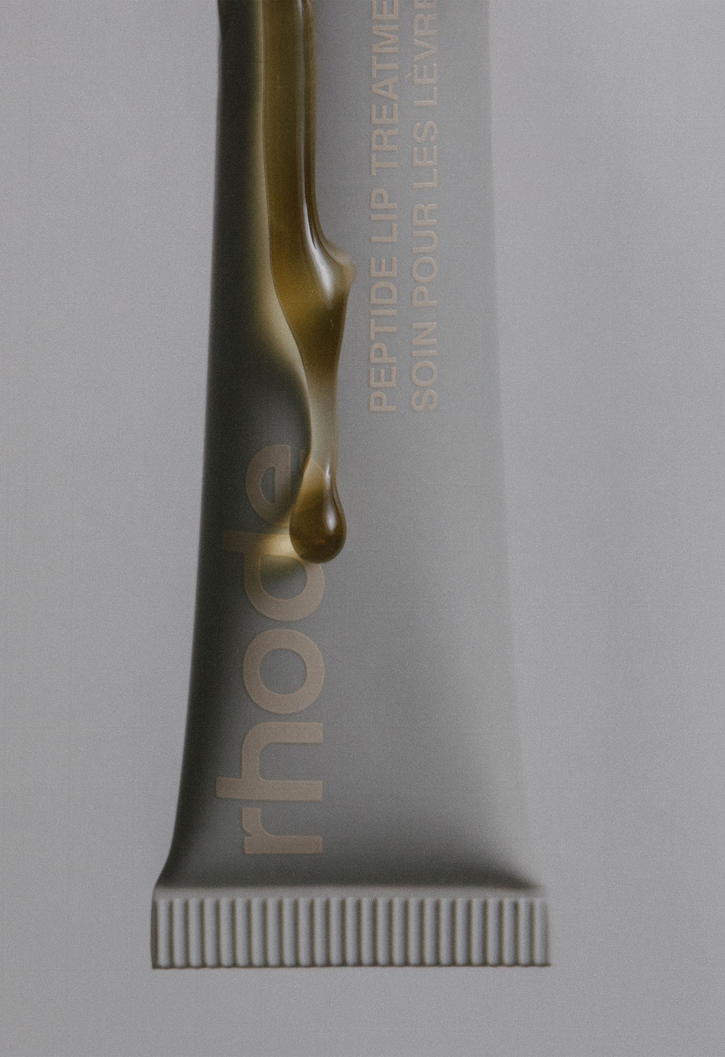 Прозорий тінт для вуст із пептидами з ароматом солоної карамелі RHODE Peptide Lip Treatment The Nourishing Lip Layer Salted Caramel