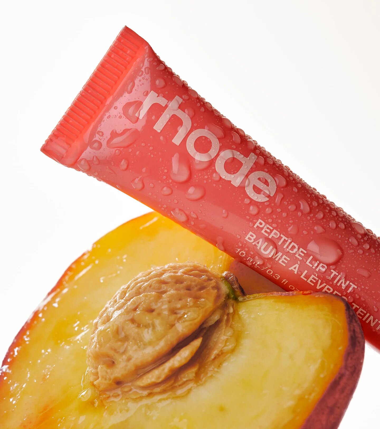 Лімітований тінт для вуст із пептидами RHODE PEACH PIT NEUTRAL PEACH Peptide Lip Tint The Tinted Lip Layer